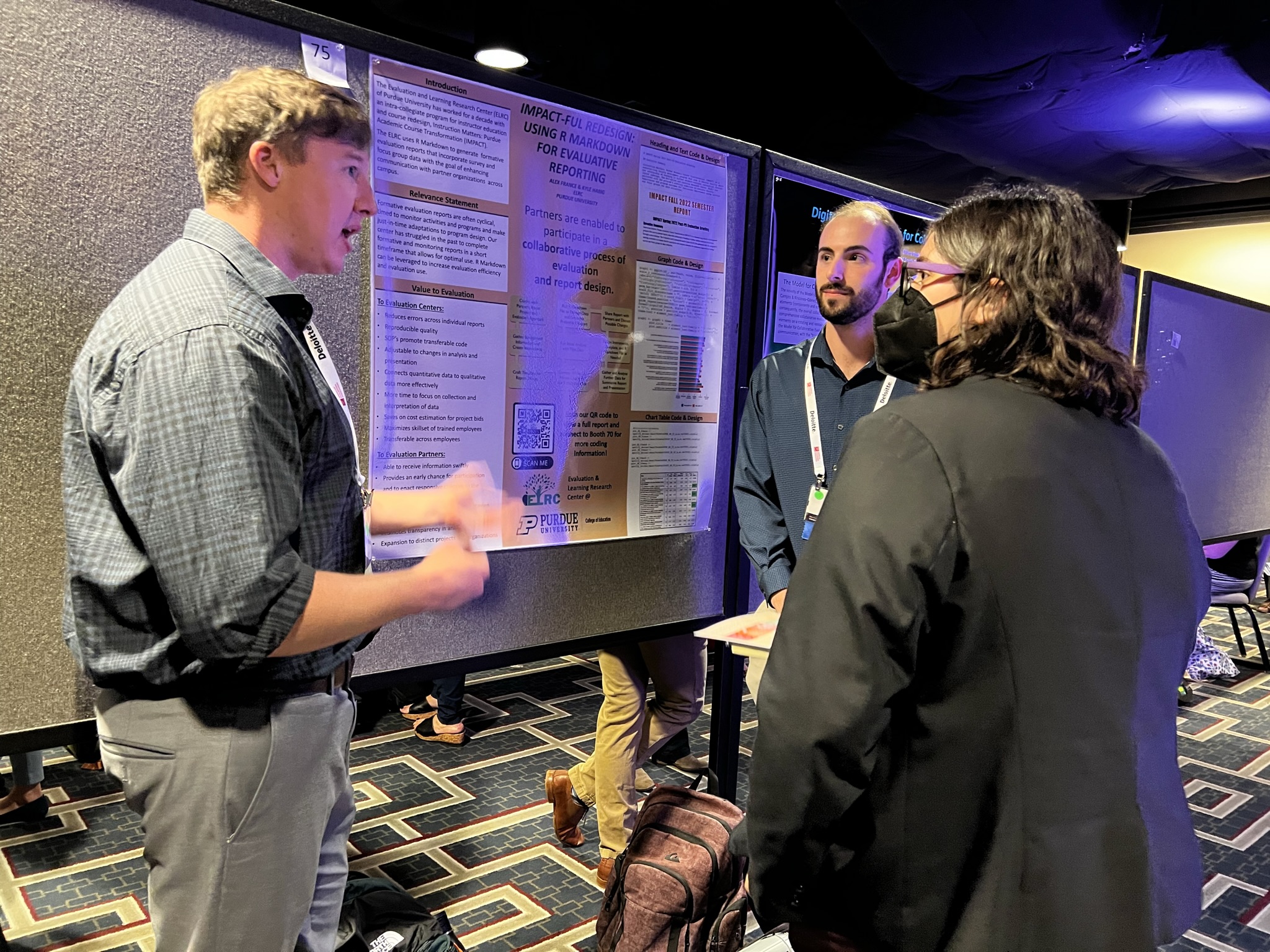 Picture of Kyle Habig and Alex France at AEA poster presentation